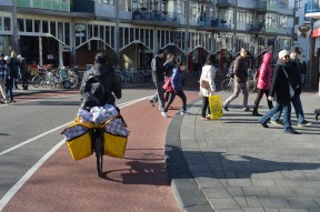 Moving luggage on a bike, central Amsterdam, mid afternoon