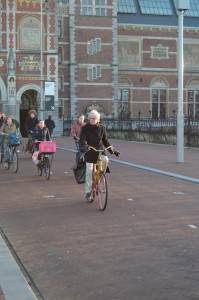 Hand signals for cyclists and pedestrians, morning rush hour, Rijksmuseum, central Amsterdam