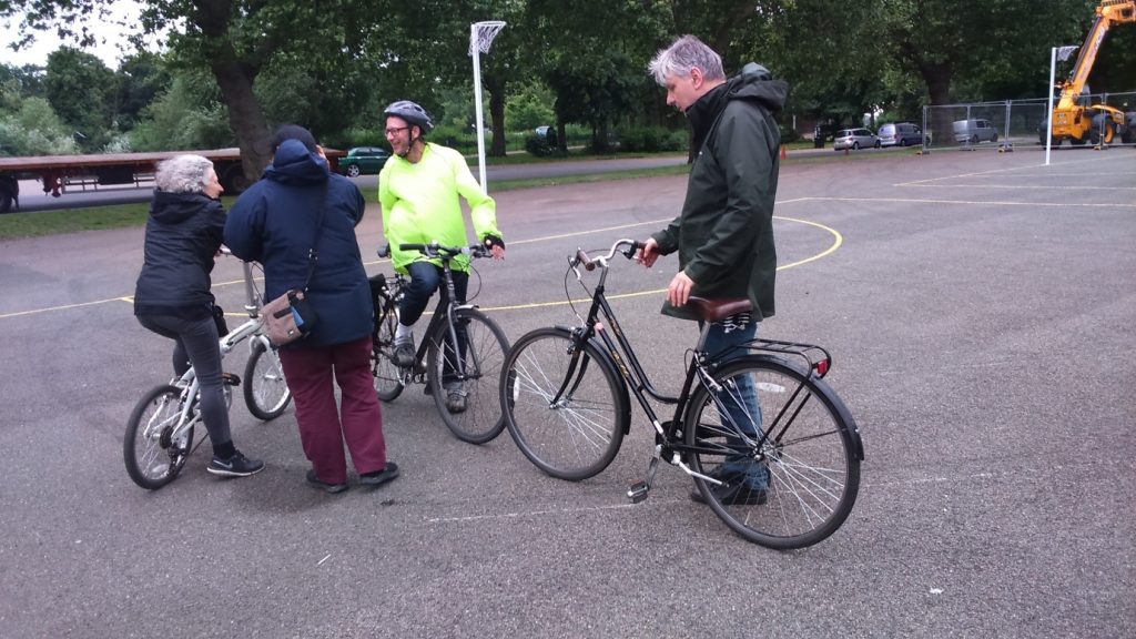 People with a diagnosis of dementia and partners chatting about cycling and more